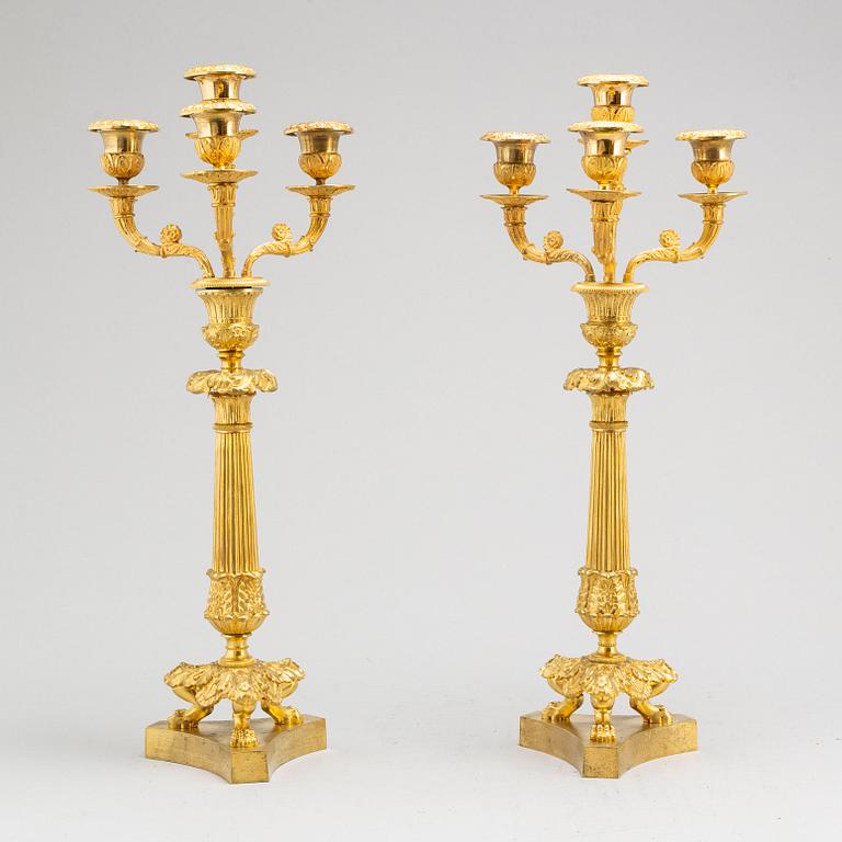 A pair of French Empire style four-light candelabra, second half of the 19th century.