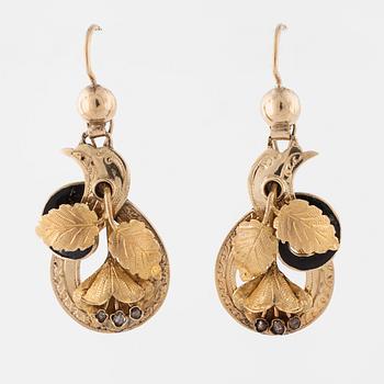 A pair of enamel and rose cut diamond earrings.