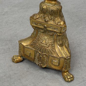A pair of 18th century brass floor candlesticks.