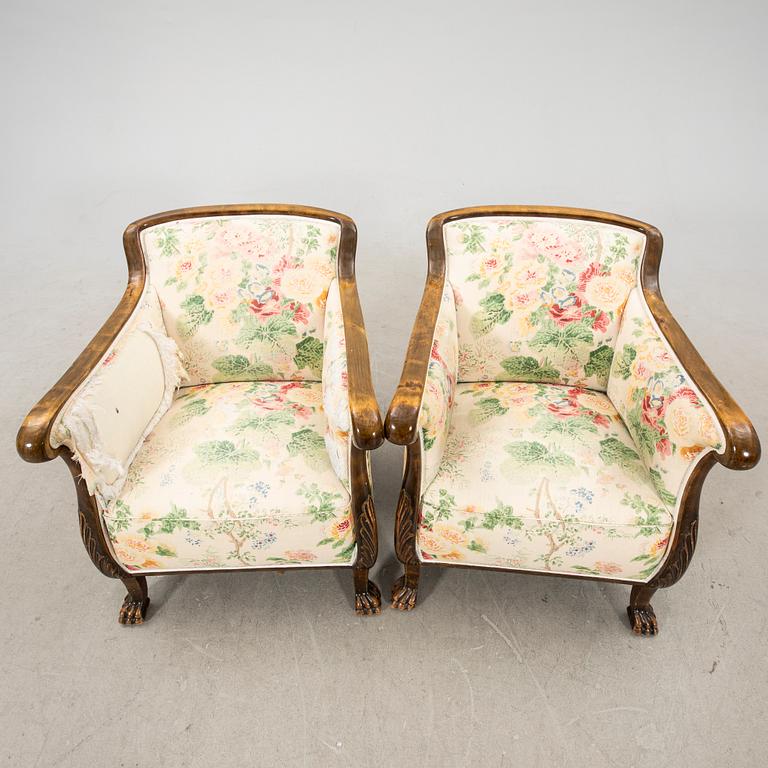 A pair of stained birch 1940s armchairs.