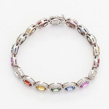 A multi-colour sapphire and diamond bracelet in 14K whitegold.