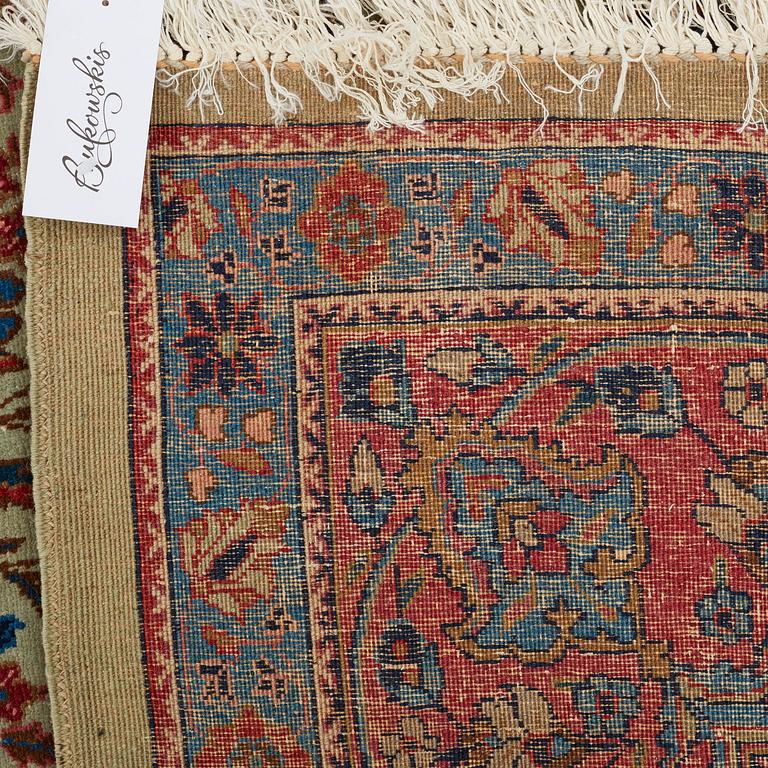A CARPET, a semi-antique Tabriz probably, ca 393 x 284 cm.
