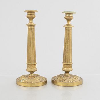 A pair of candlesticks, late Empire, France, mid-19th century.