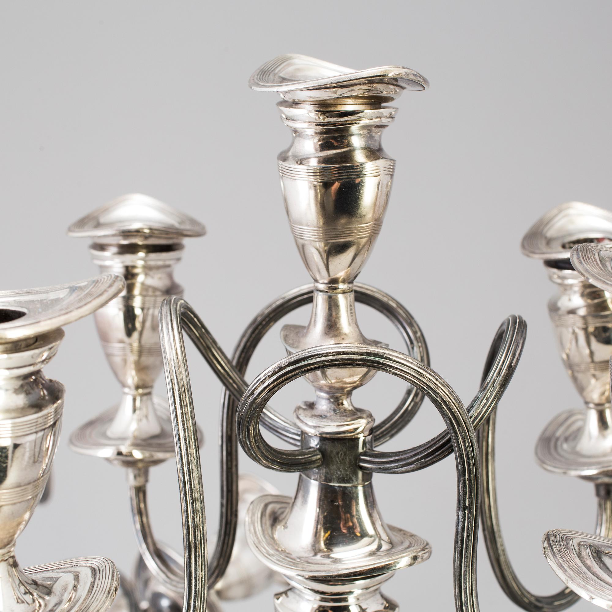 A PAIR OF SILVER PLATE CANDELABRA, regency style, England, first half of the 20th century.