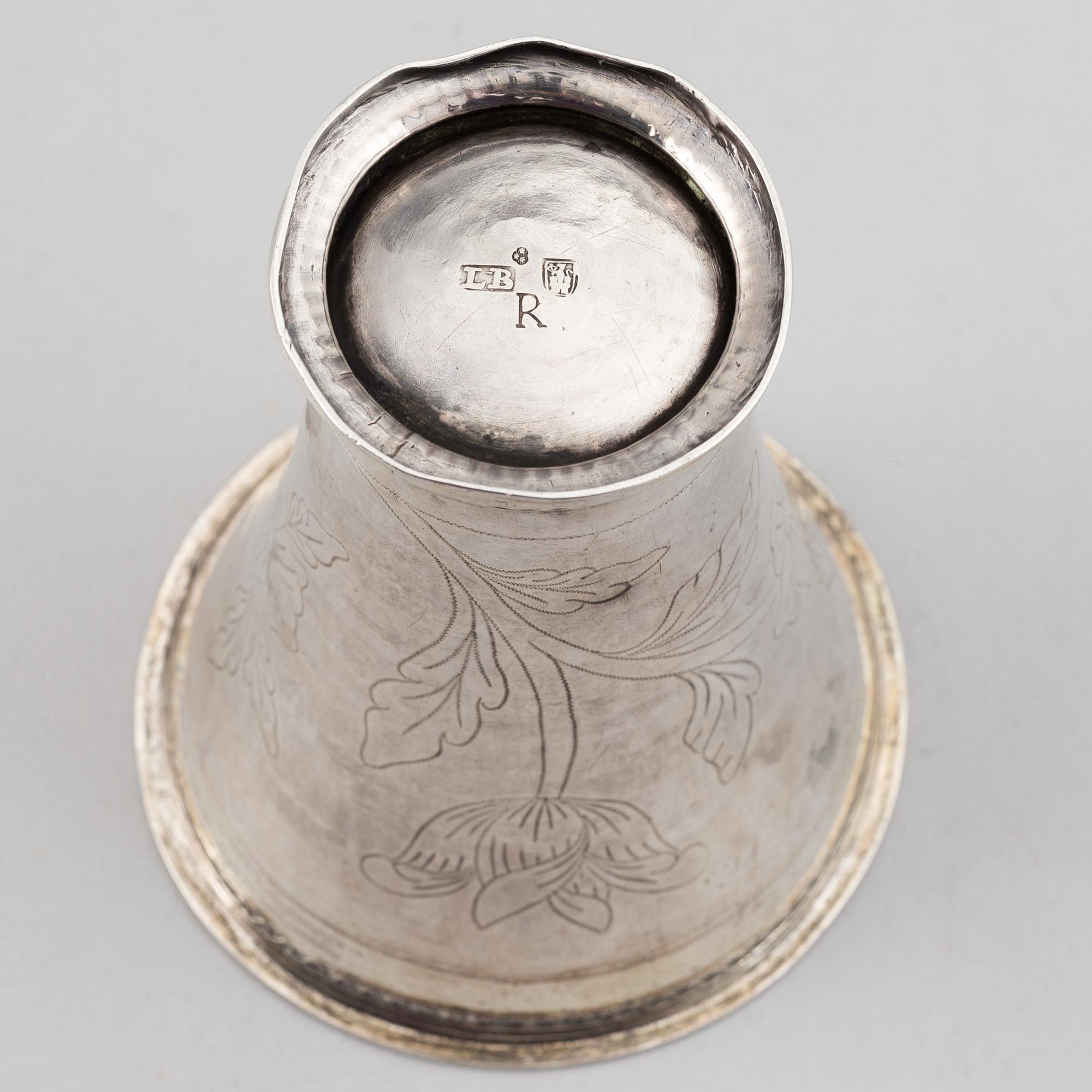 A silver creamer, beaker, and platter, Sweden, 18-19th century.