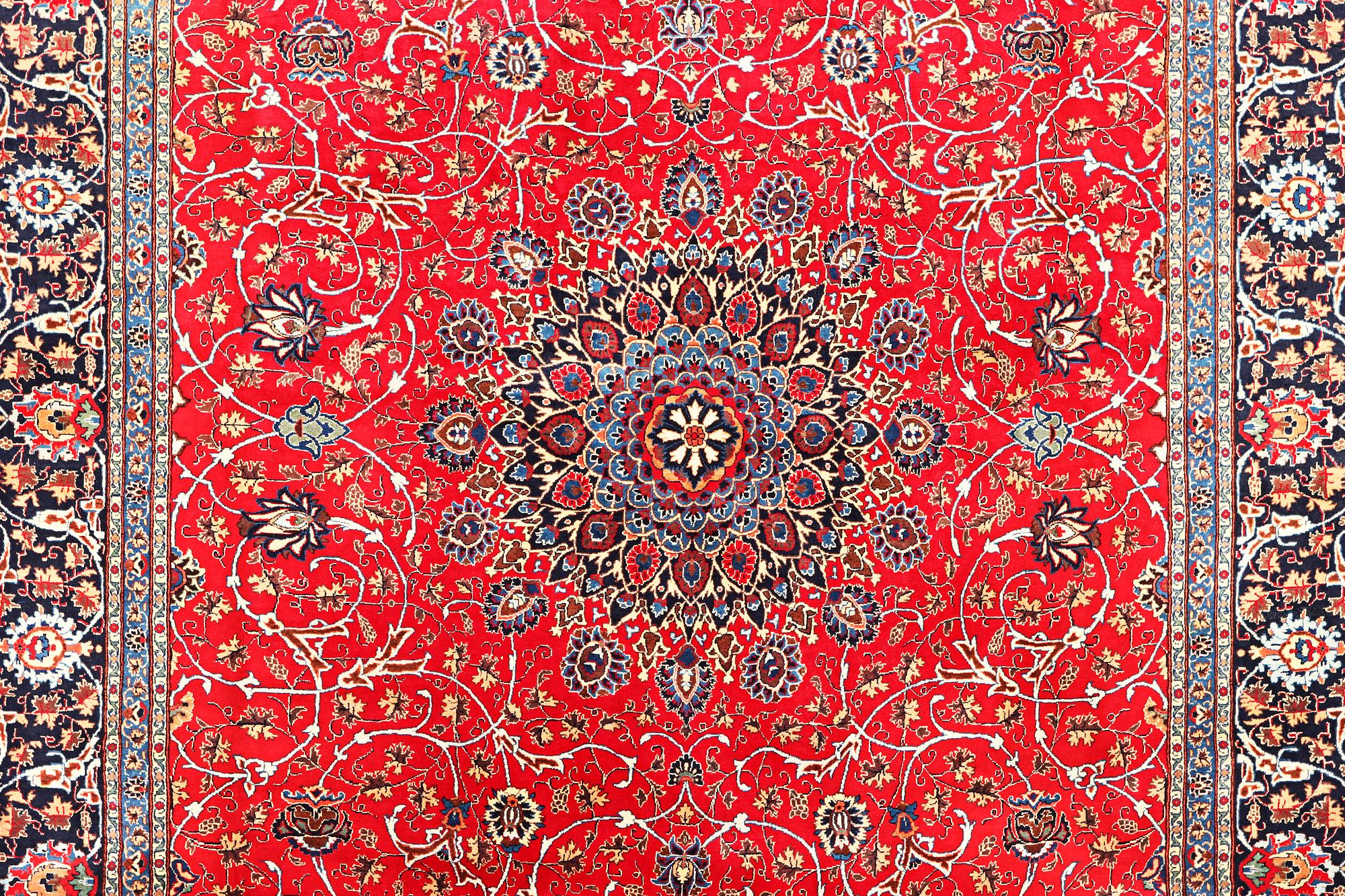 A Kashan carpet, c. 400 x 297 cm.
