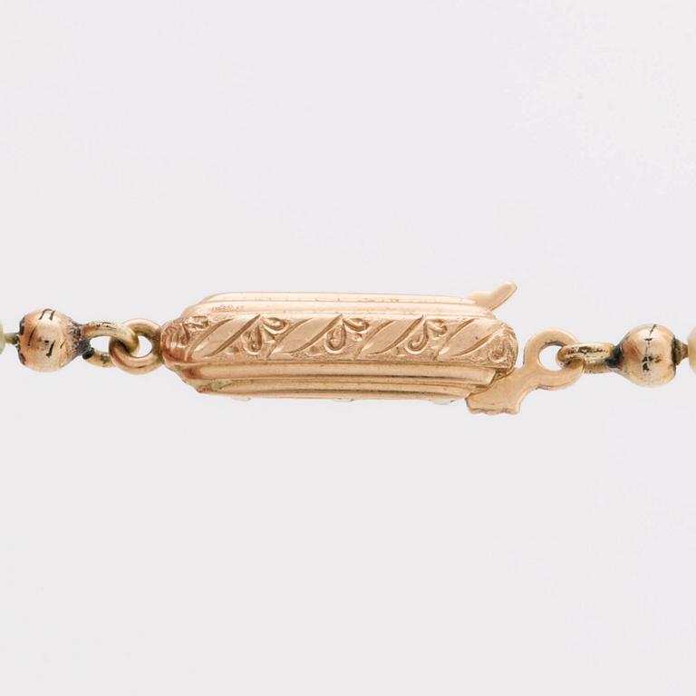 PÄRLCOLLIER odlade pärlor ca 2,5 - 5,5mm, lås i 18K guld.