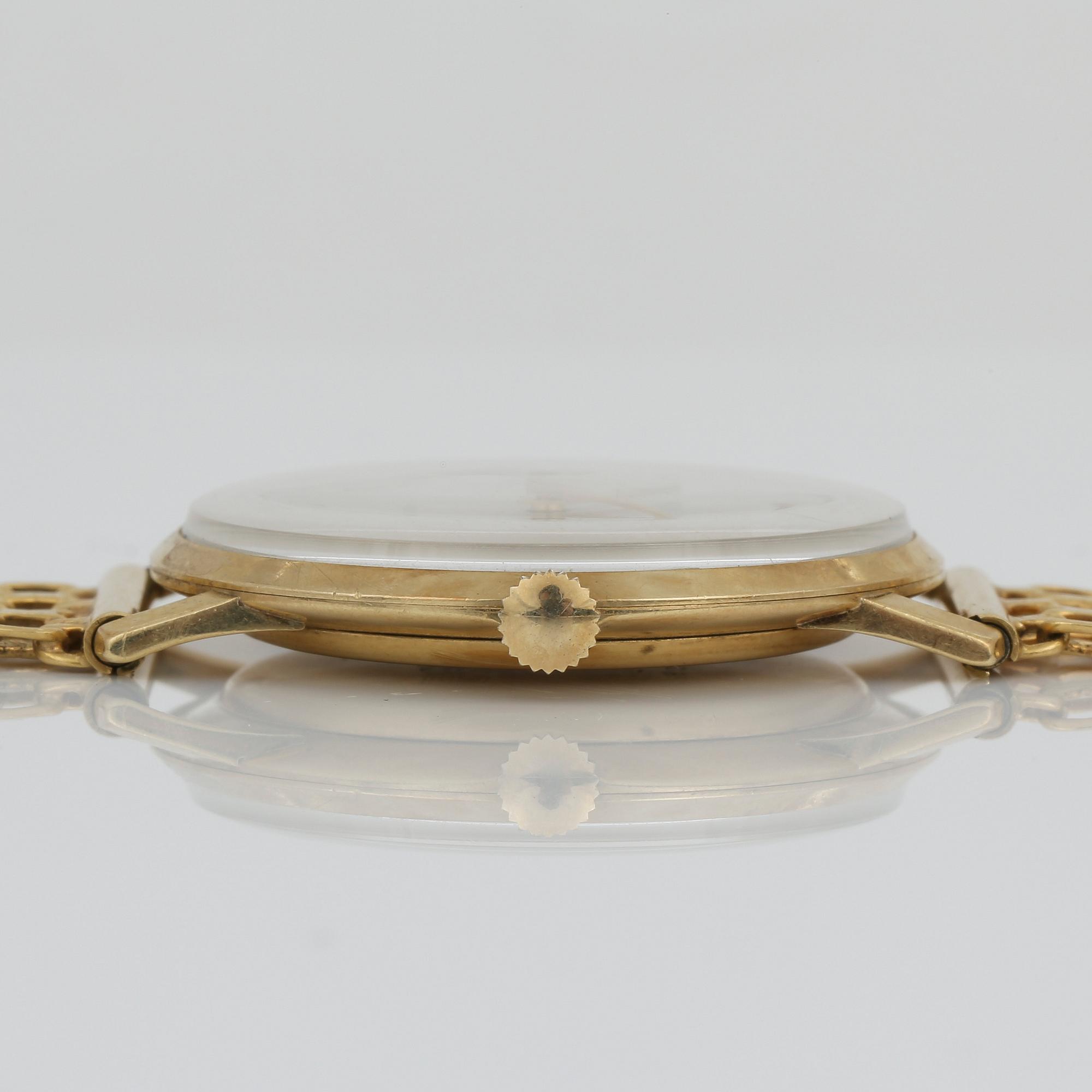 ARMBANDSUR, Precimax, med boett i 14K guld samt armband i 18K guld, stampläd Stockholm, 1963. Total vikt ca 47,4 g.