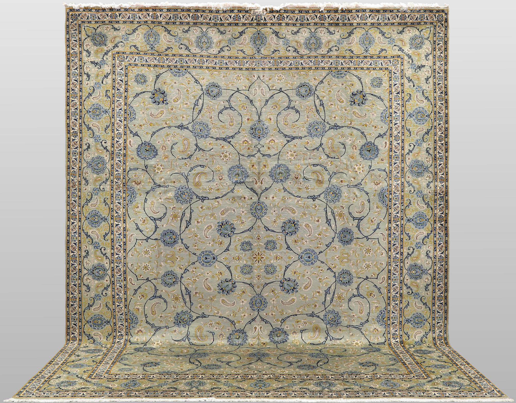A Royal Keshan carpet, signed, 410 x 307 cm.