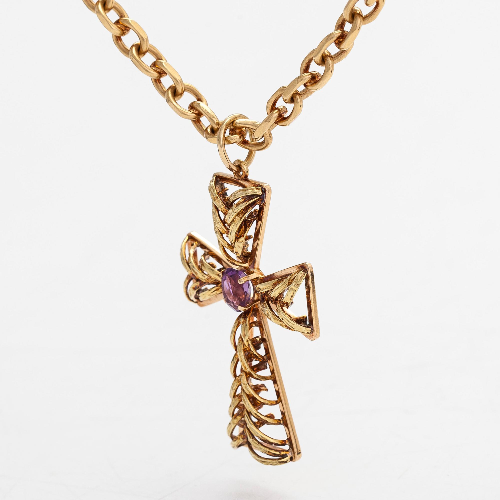 Necklace, 18K gold, cross pendant in 16K gold   with an amethyst. Chain by Anderssons Guld, Stockholm 1982.