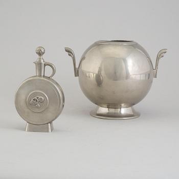 A 1930´s pewter vase and bottle.