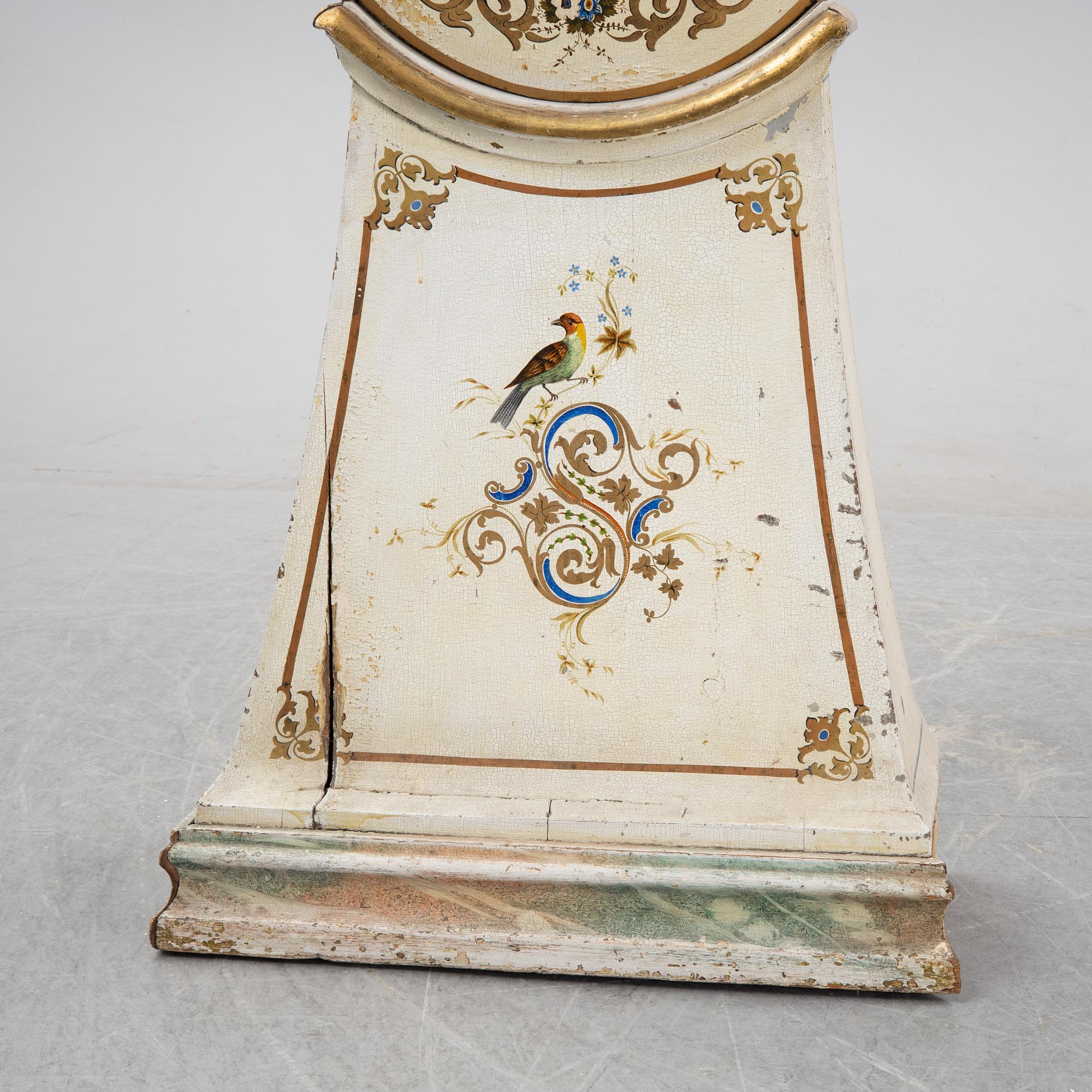An 18th Century painted long case clock.