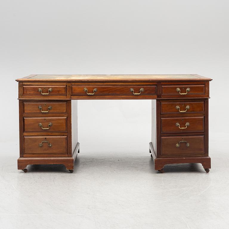 A 20th century writing desk, England.