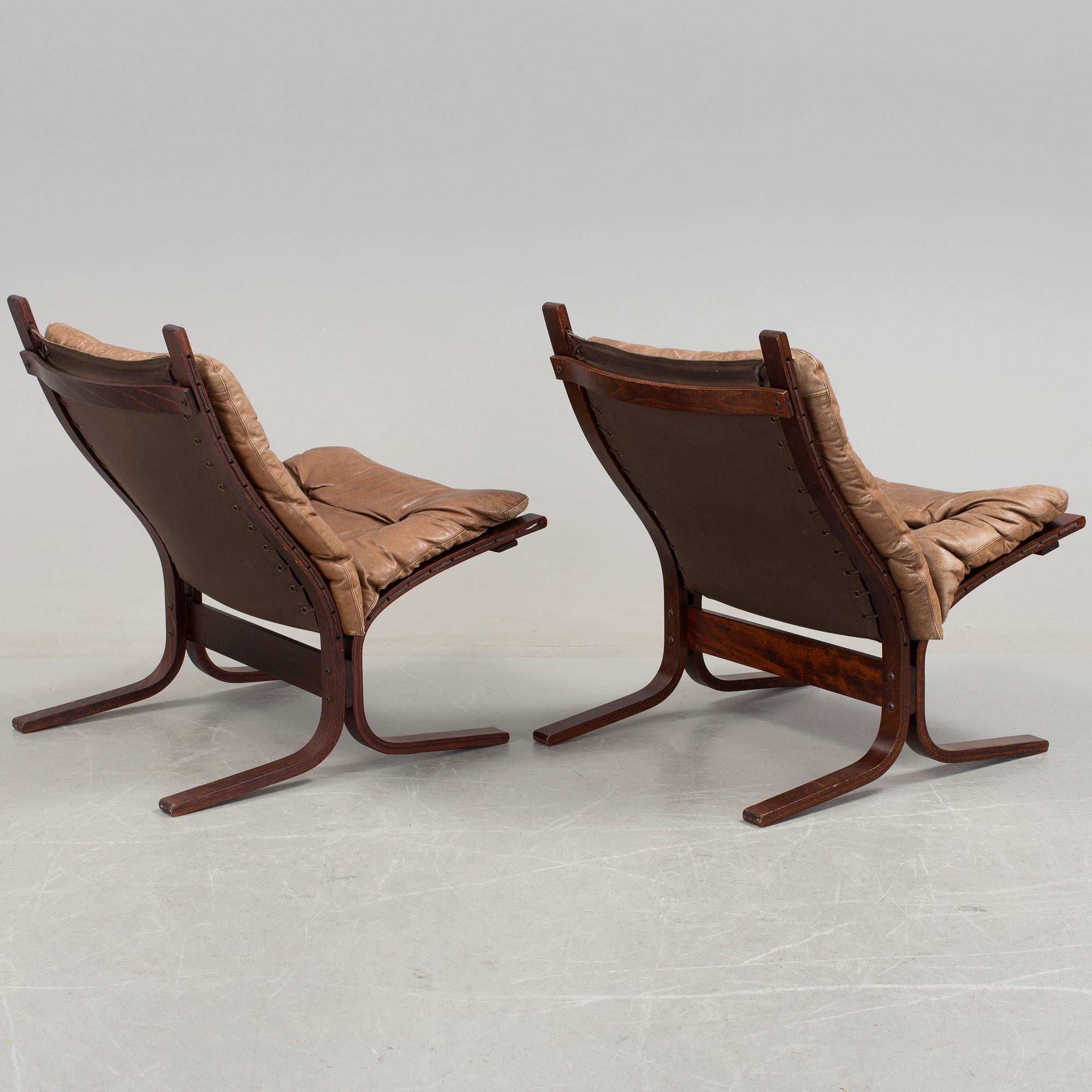 A pair of 1970s "Siesta", easy chairs and sofa tables by Ingmar Relling, Norge.