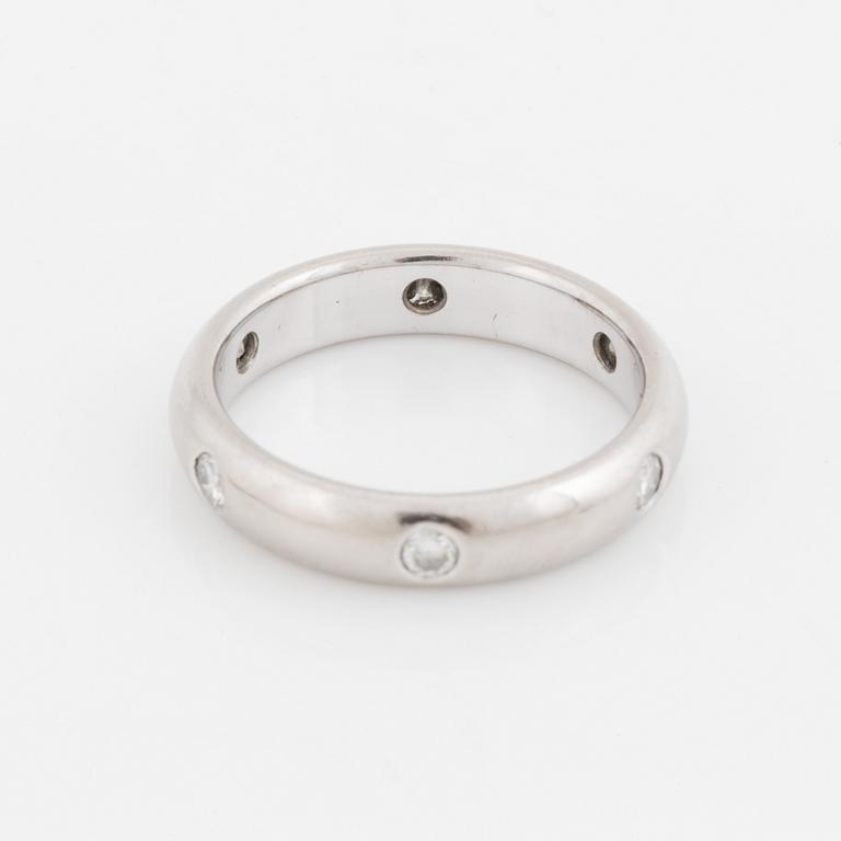 An 18K white gold Cartier ring set with round brilliant-cut diamonds.