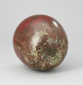 A Hans Hedberg faience apple, Biot, France.