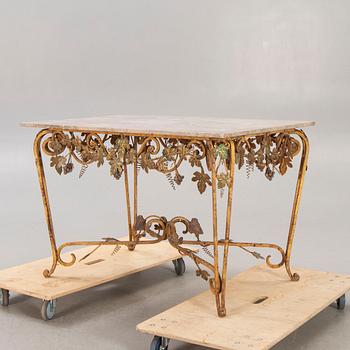 A mid 20th century wrought iron graden table.