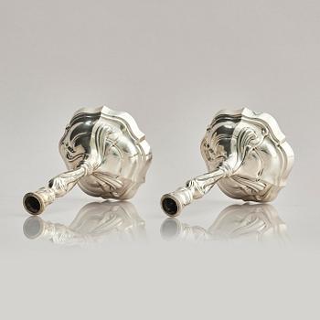 A pair of German silver Rococo candlesticks, marks of Johann Jacob Baur, Augsburg 1777-1779.