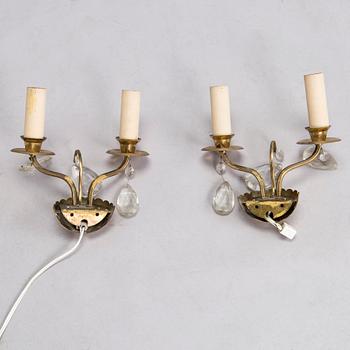 Four of mid-20th century wall sconces.