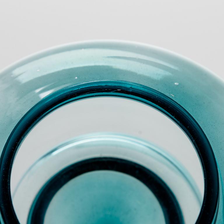 ALEKSI PUUSTINEN, A three-piece glass candleholder, signed.