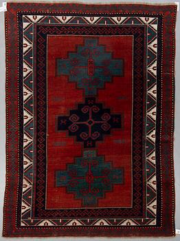 A CARPET, a semi-antique Kazak probably, ca 277 x 198,5 cm.