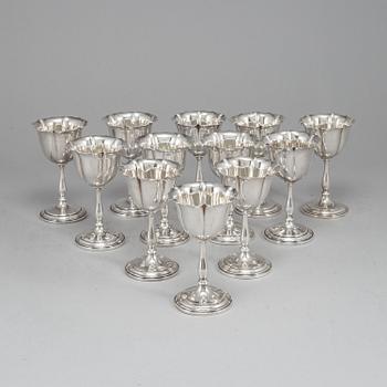 A set of twelve 20th century sterling silver dessert-glasses.