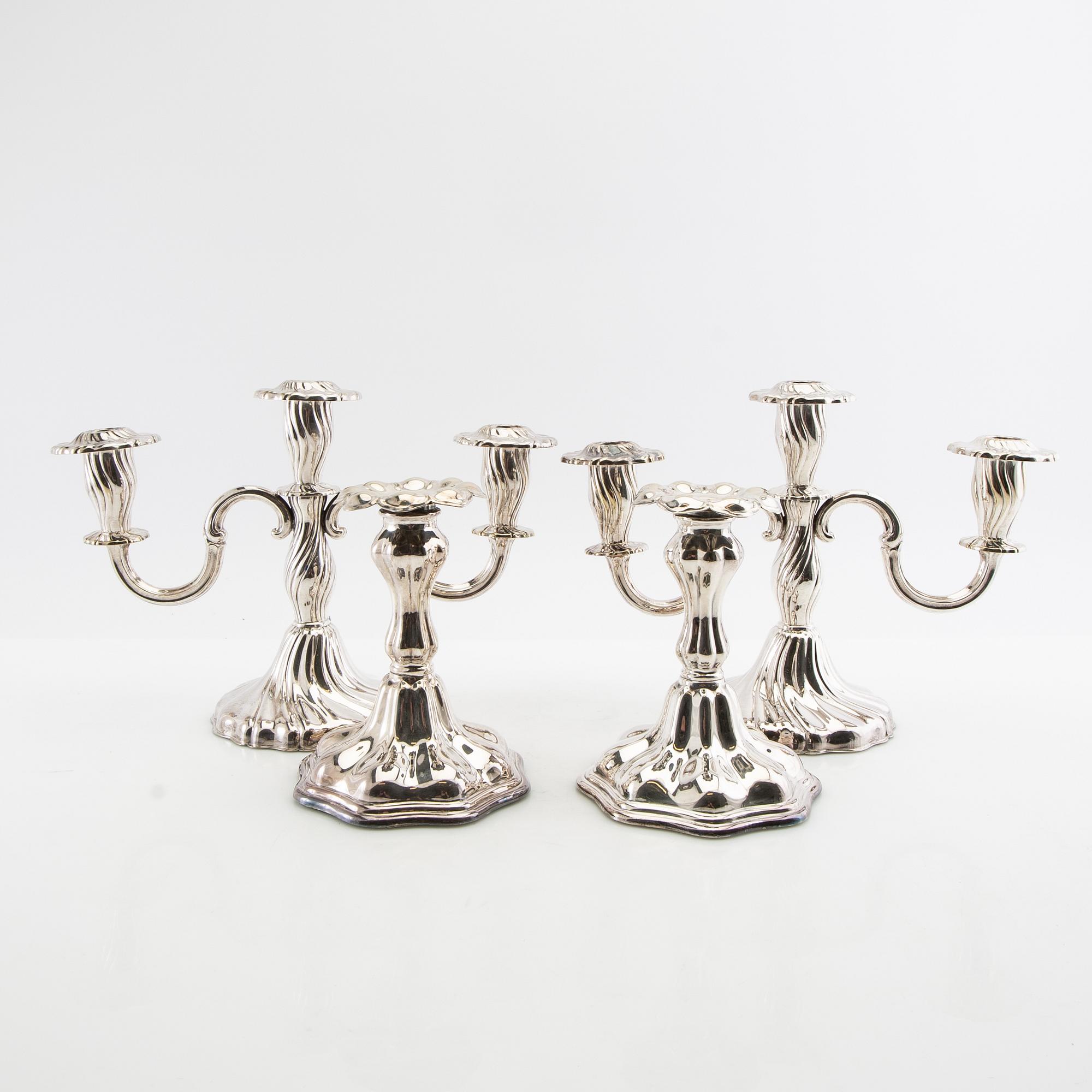 Candelabras a pair and candlesticks a pair Rococo style silver plate 20th century.