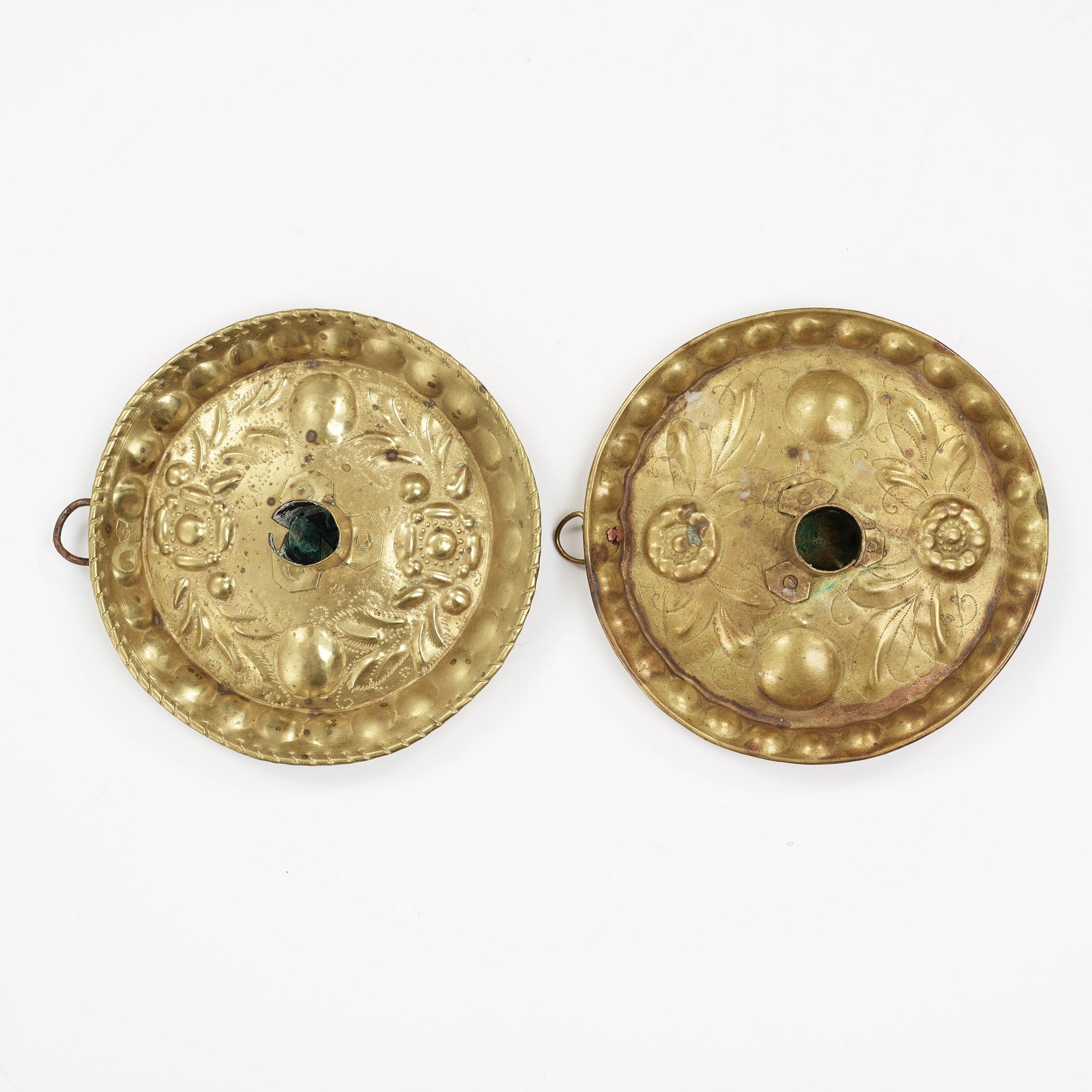 two brass candle holders from the 18th century.