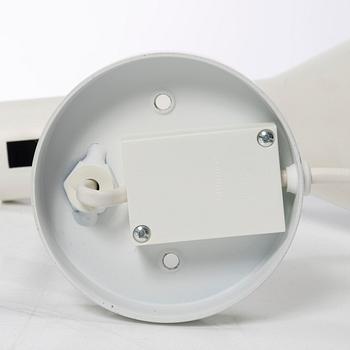 Arne Jacobsen, An 'AJ' wall lamp. Louis Poulsen, 21st century.