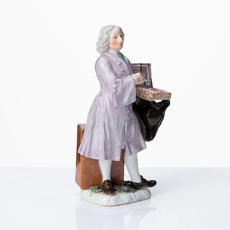 A Meissen porcelain figure of a trinket salesman from the series of Parisian street-traders, circa 1745.