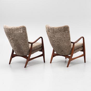 Ib Madsen & Acton SChubell, a pair of 'Pragh' armchairs, Madsen & SChubell Co, Denmark, 1940's/50's.