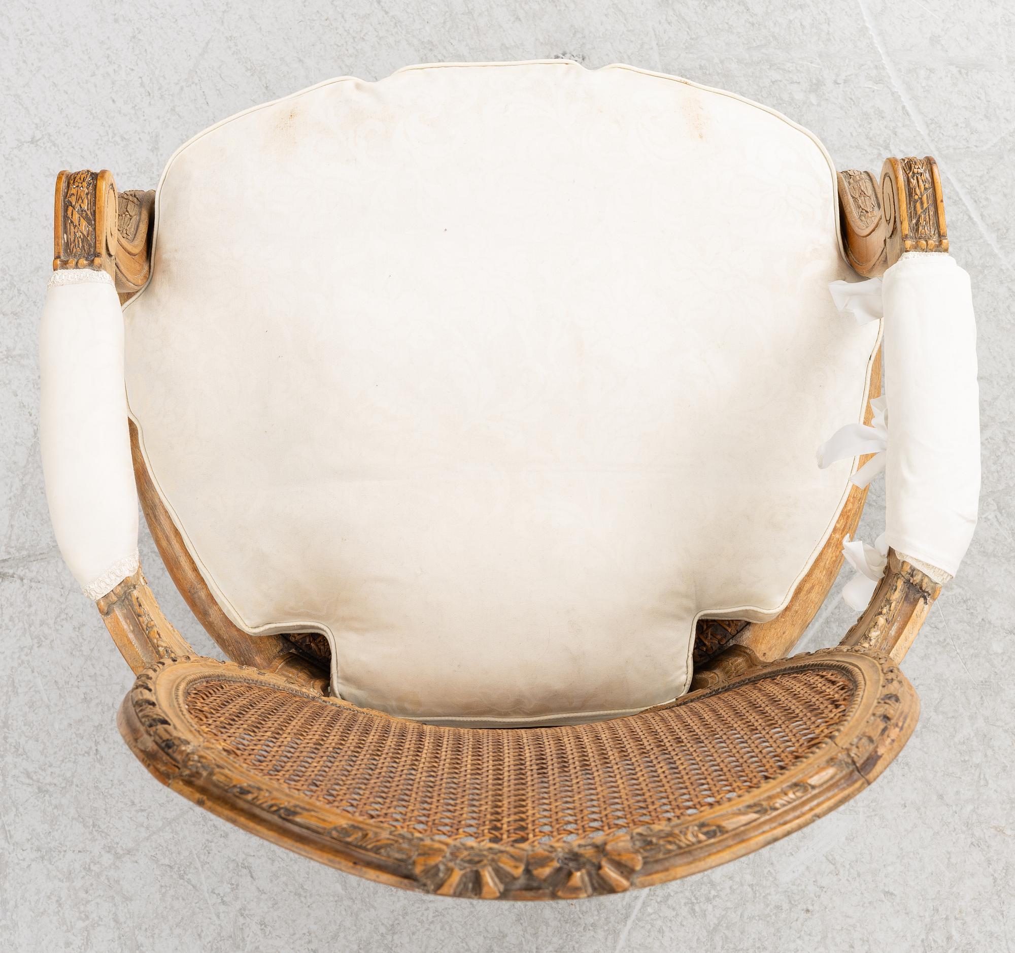 A Louis XVI-style armchair, 19th century.