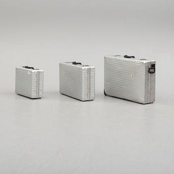 A set of three Rimowa bags later part of the 20th century.
