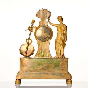 A French Empire gilt bronze mantel clock, 19th century.