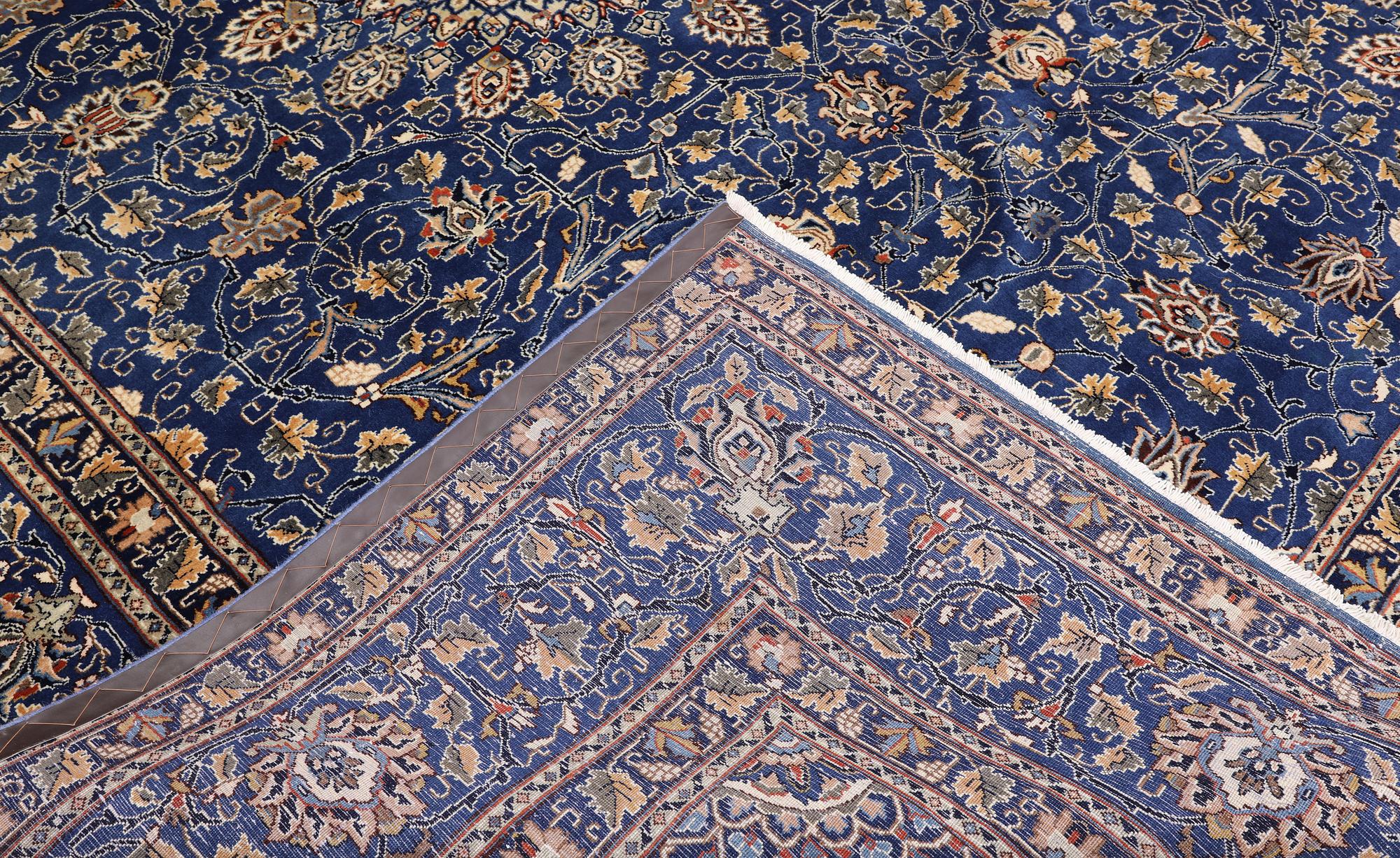 A Kashmar carpet, 408 x 307 cm.