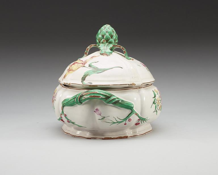 An unmarked faience tureen with cover, 18th Century.