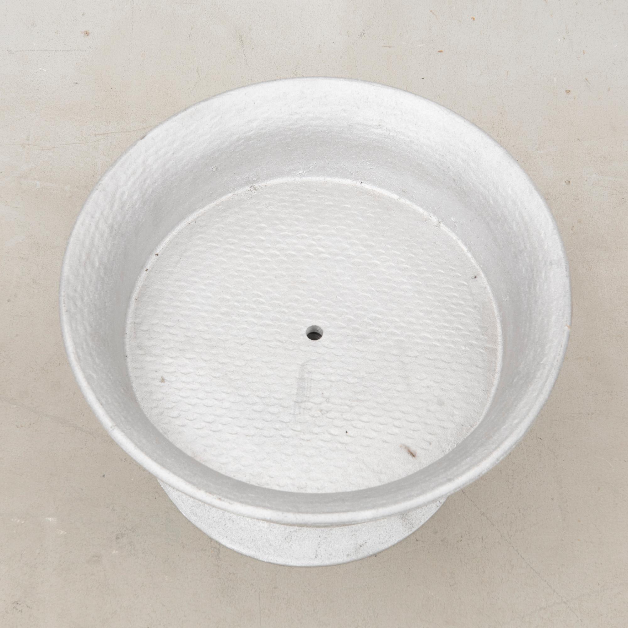 Signe Persson-Melin, ytterfoder Byarums bruk gjuten aluminium.