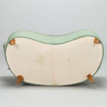 A mid-20th-century sofa.