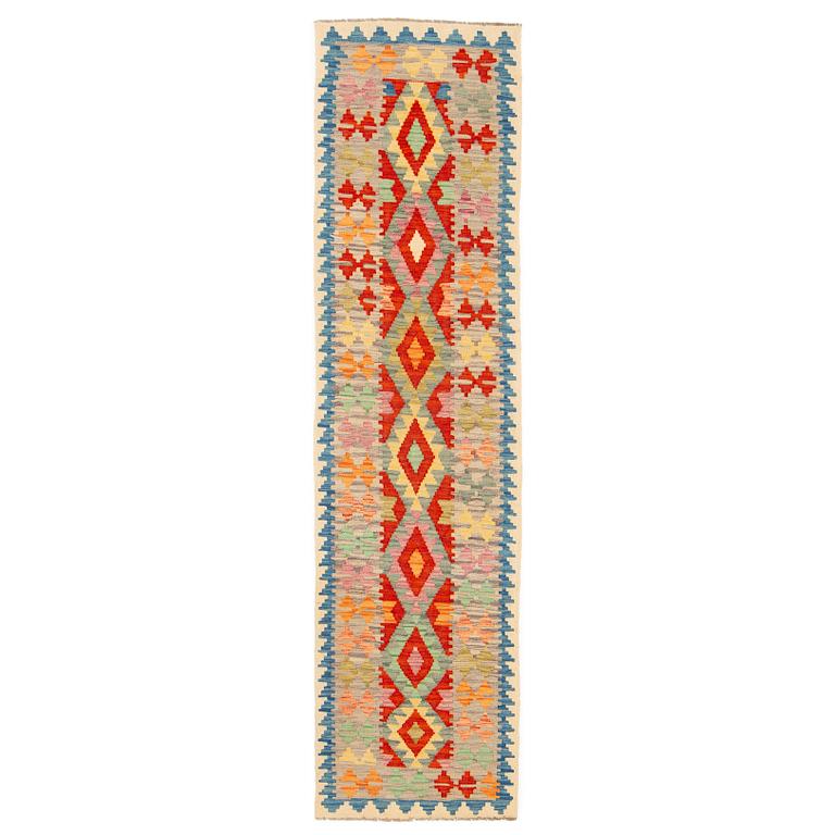 A kilim runner, c 297 x 76 cm.