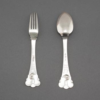 a silver fork and spoon for Holger Kyster in Denmark, 1910s.