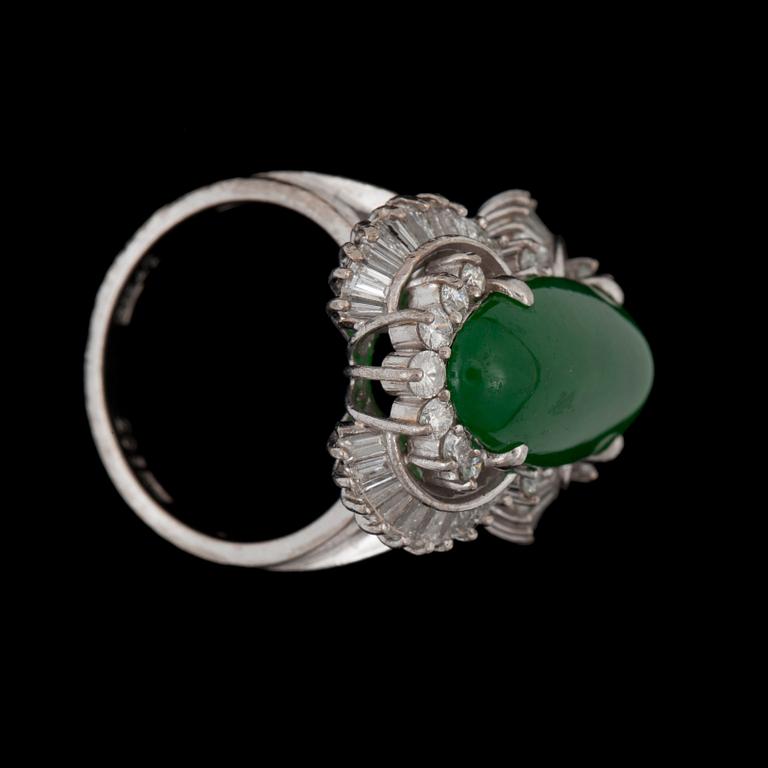 A Jadeite and diamond ring. Diamond total carat weight circa 1.00 ct.