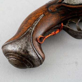 A flintlock gun, 18th century.