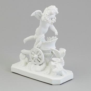 A bisquit figure of a putto on a chariot, Paris, France, possibly 18th Century.