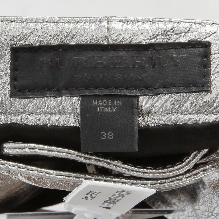 BURBERRY prorsum, a pair of silver colored leather pants. Size 38.