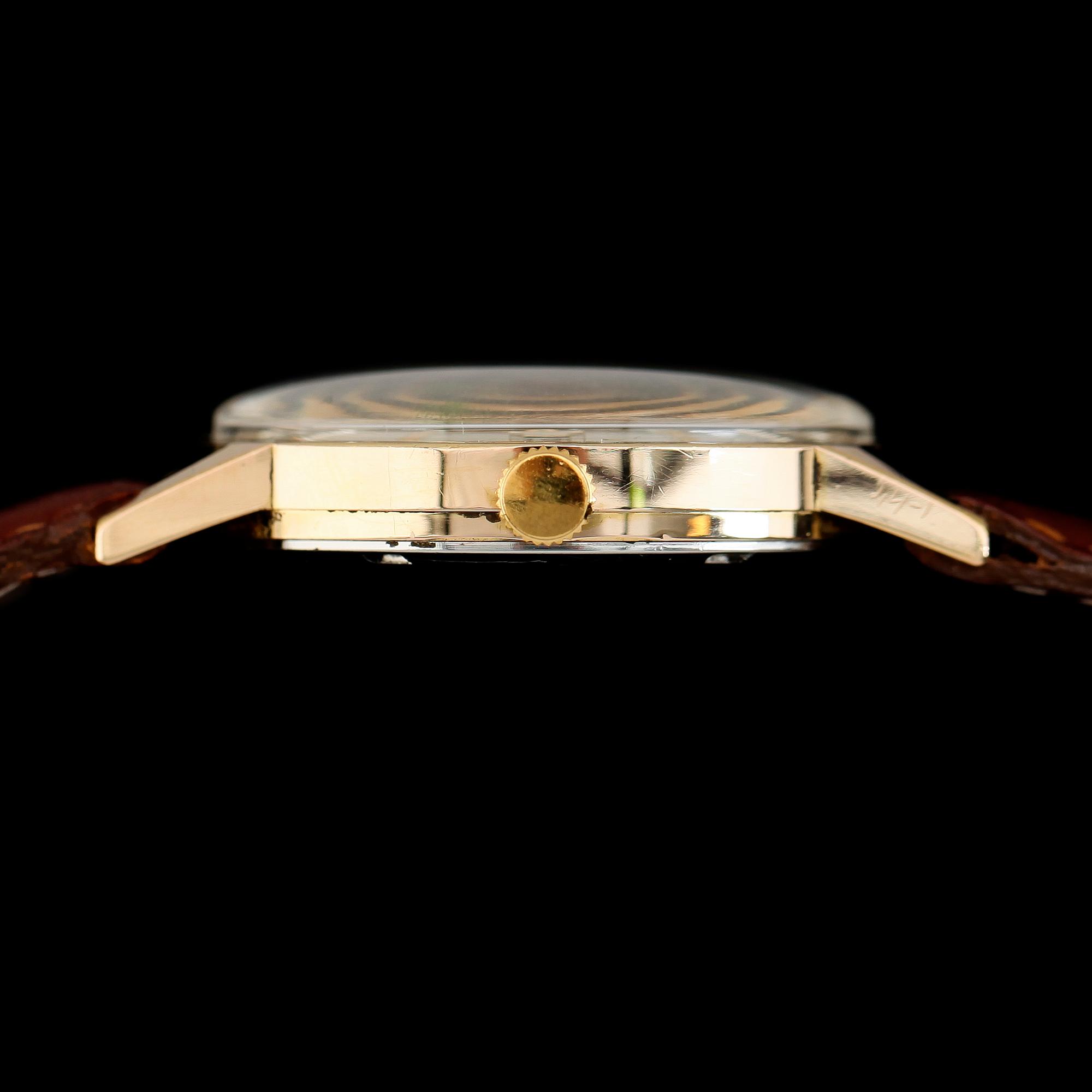 ARMBANDSUR, guld på stål, Preto, 1900-talets mitt.