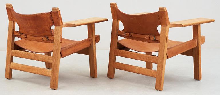 A pair of Børge Mogensen oak and leather 'Spanish Chair' by Fredericia Stolefabrik, Denmark.