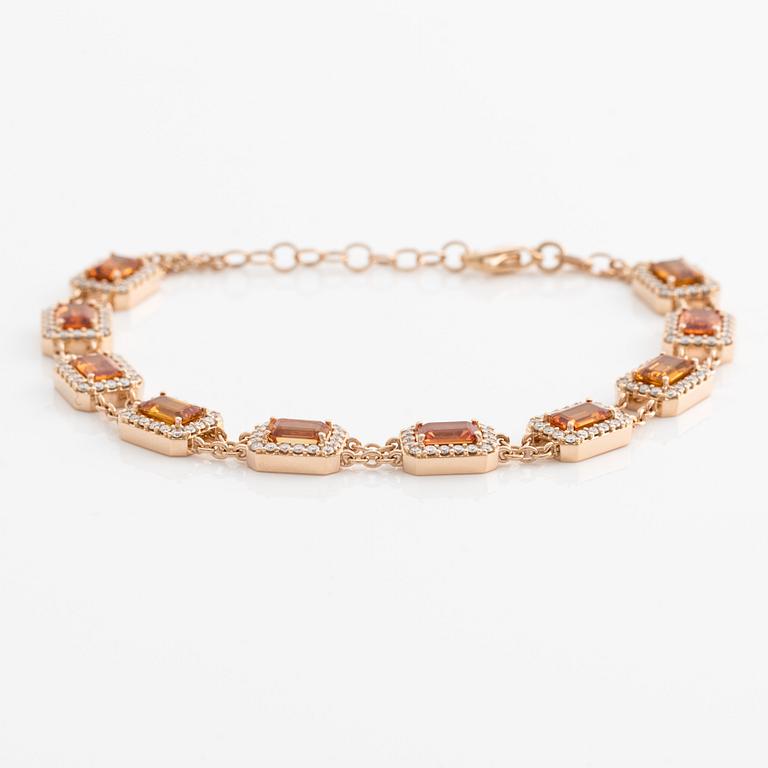Bracelet 18K gold with orange sapphires and round brilliant-cut diamonds.