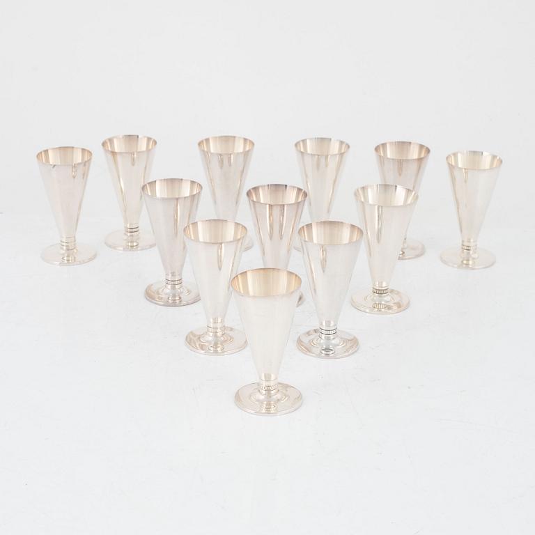 A group of twelve silver schnaps glasses , Tore Eldh, K&EC, Gothenburg, Sweden, 1949-1958.