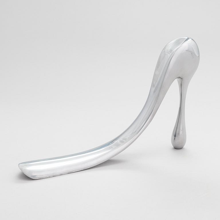 A metal shoe horn by Manolo Blahnik, 2000s.