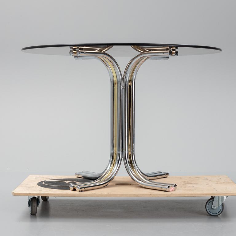 An iIalian glass top dining table, 1970's/80's.